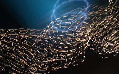 Abstract lines of light representing movement and focus.